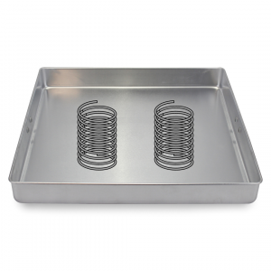 A silver tray with two silver springs sitting in it - Poka-Yoke Mistake Proofing